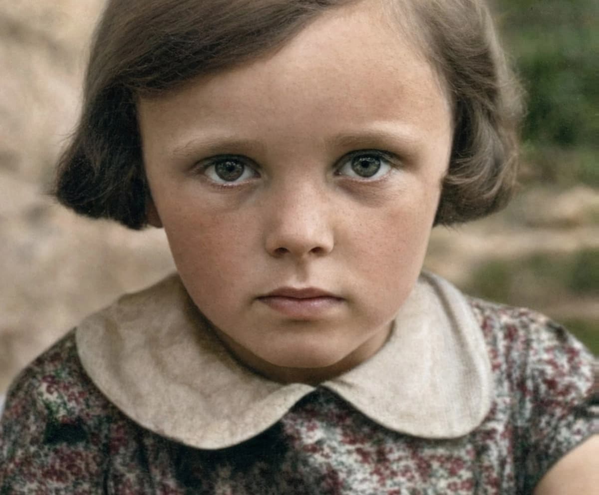 Photo of a young child restored and colorized with AI